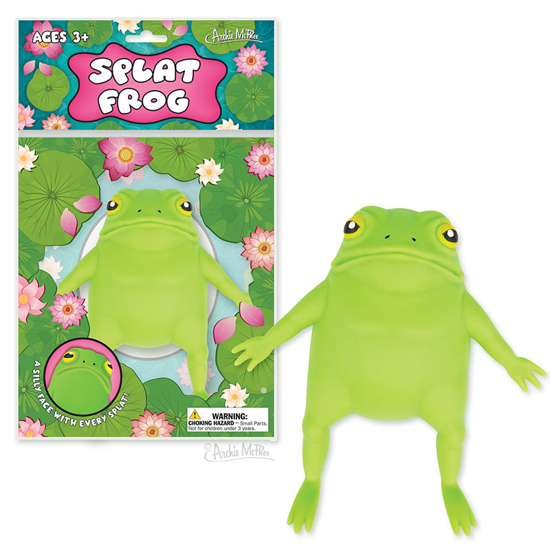The Splat Frog is a soft TPR toy with big eyes and outstretched limbs, filled with sand for a squishy feel, shown on a lily pad and water lily background.